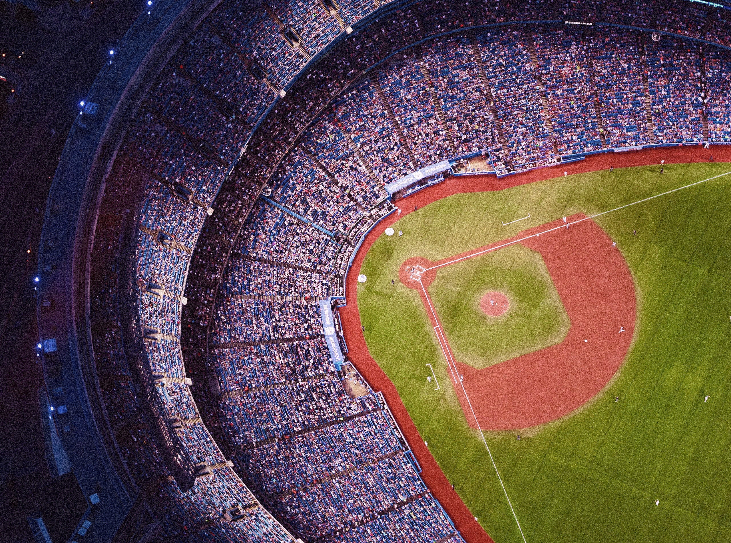 Aerial view of a baseball stadium filled with spectators